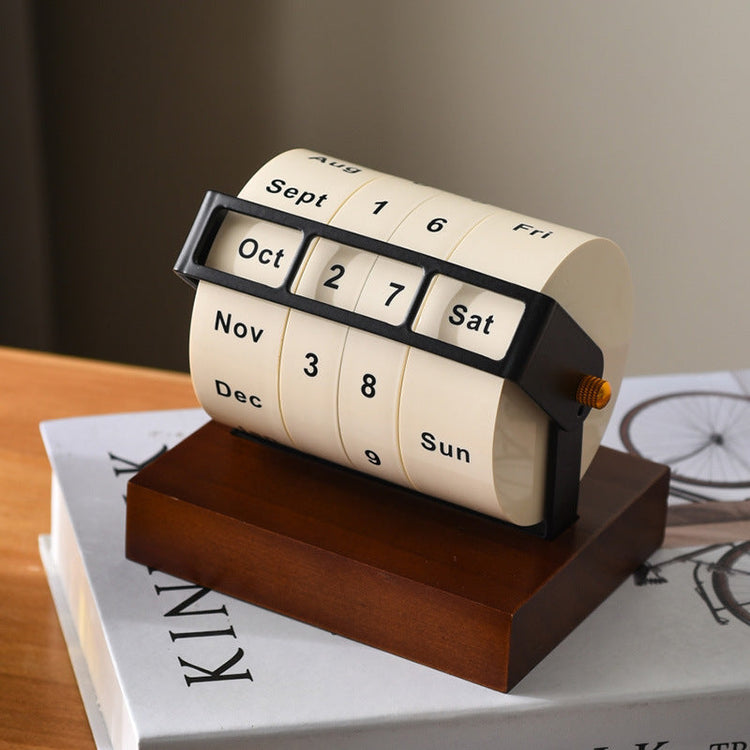 Rotating perpetual desk calendar milled from aluminium