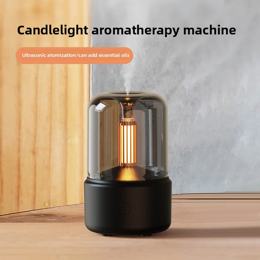 Aroma diffuser with a flickering simulated candle flame