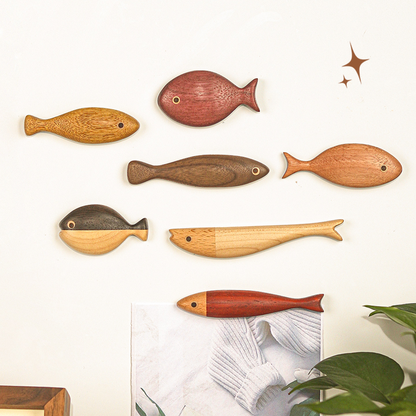 Fish fridge magnets cut from named hardwoods