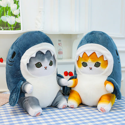 Plush cat in a shark hood, doubling as a cushion