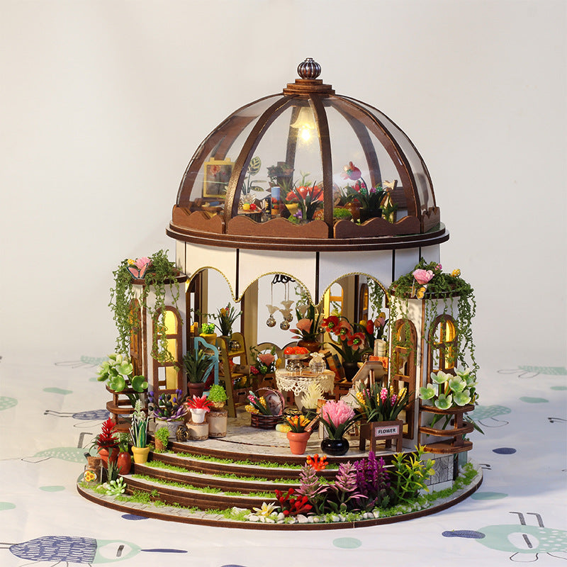 Kit de casa de madera DIY con jardín en la azotea
