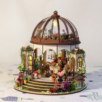 Kit de casa de madera DIY con jardín en la azotea