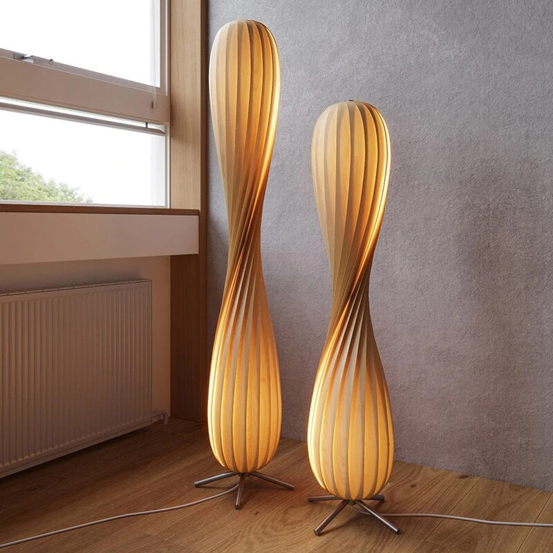 Table lamp with a real wood veneer shade glowing amber