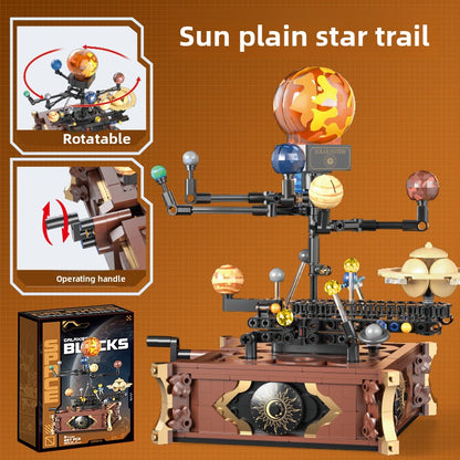 Hand-cranked solar system model built from blocks