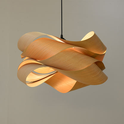 Pendant light in real wood veneer glowing warm amber