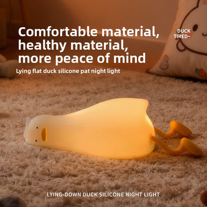 Soft silicone duck lamp switched and dimmed by tapping