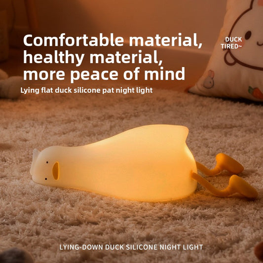 Soft silicone duck lamp switched and dimmed by tapping
