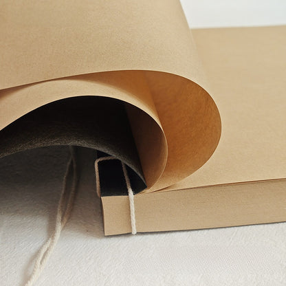 Hand-stitched sketchbook with exposed thread binding